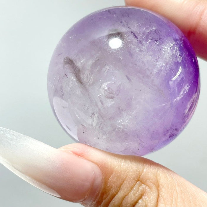 Amethyst Enhydro Quartz sphere With Moving Bubble