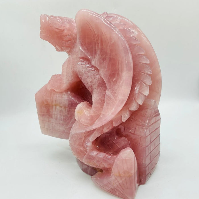 Large Unique Madagascar Rose Quartz Dragon With Castle Carving