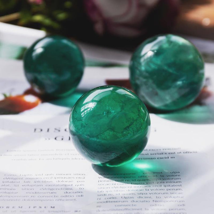 green fluorite crystal spheres with rainbow