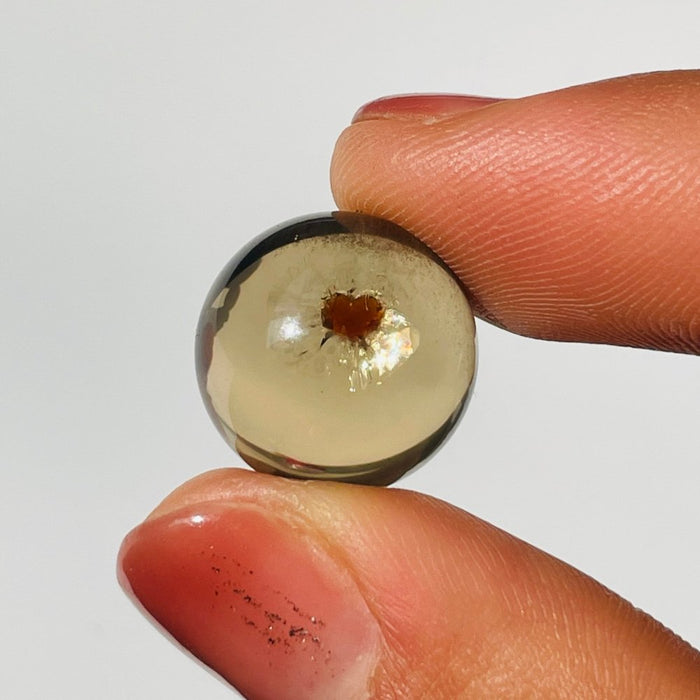 Rare Clear Quartz Sphere With Garnet Heart